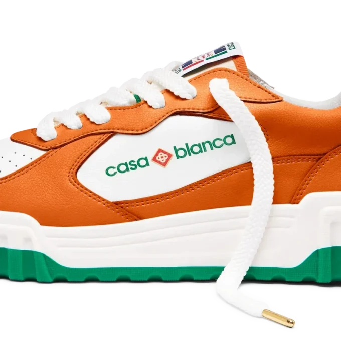 Court sneaker voor dames in oranje en wit Court sneaker voor dames in oranje en wit
