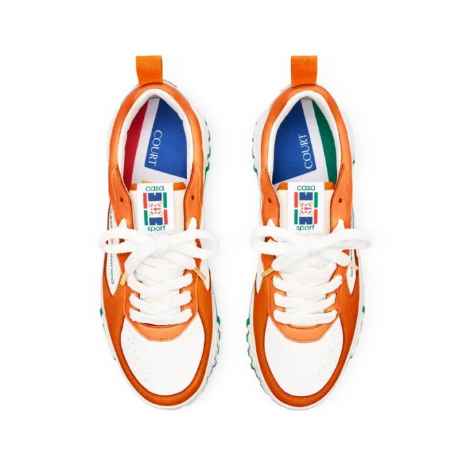 Court sneaker voor dames in oranje en wit Court sneaker voor dames in oranje en wit