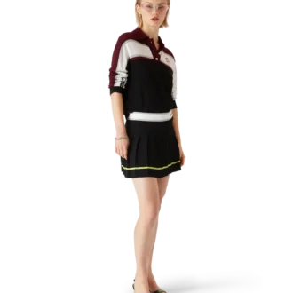 Gestrept oversized poloshirt met lange mouwen Gestrept oversized poloshirt met lange mouwen