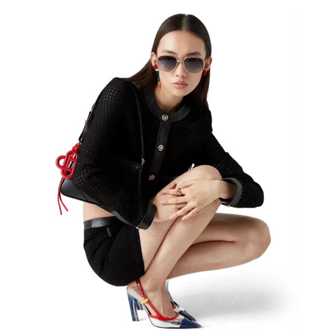 Kort getailleerd jasje met open weefsel