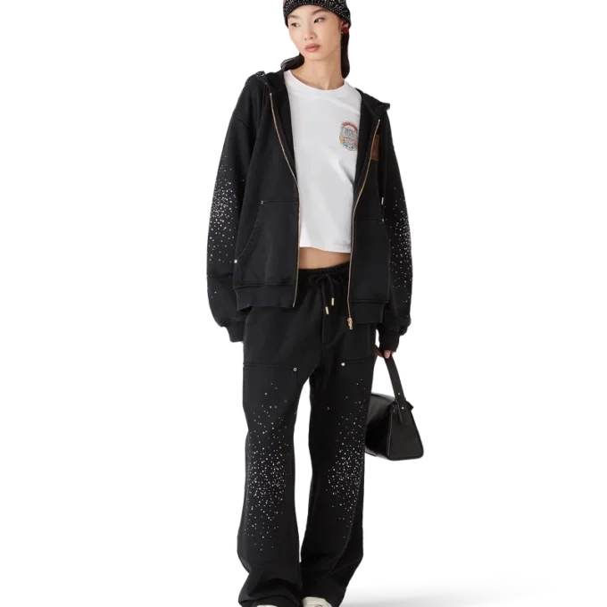 La Pramonition joggingbroek met kristallen versiering La Pramonition joggingbroek met kristallen versiering