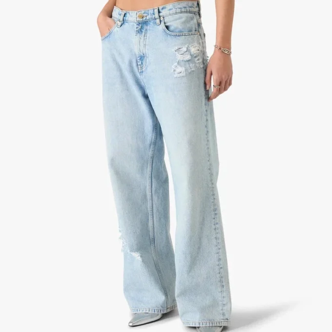 Lichtgewassen graffiti-denimjeans