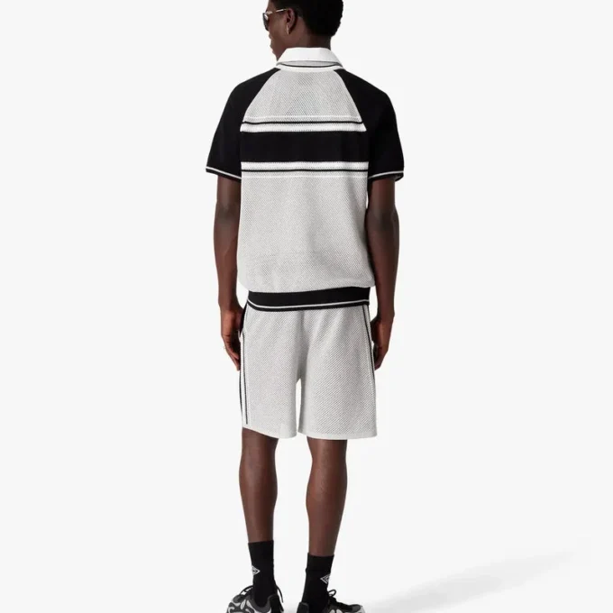 Metallic mesh gestreept poloshirt met korte mouwen en rits