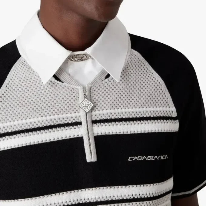 Metallic mesh gestreept poloshirt met korte mouwen en rits