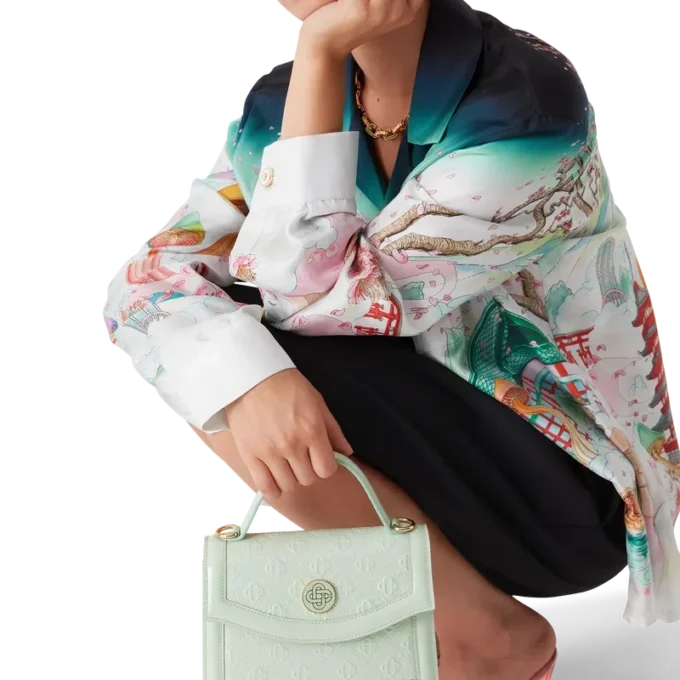 Mini Jeanne-tas met mintkleurig monogram in reliëf