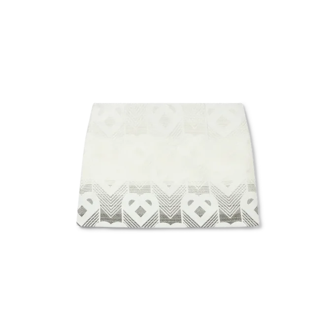 Minirok van badstof met hartjesmonogram in kleurverloop Minirok van badstof met hartjesmonogram in kleurverloop