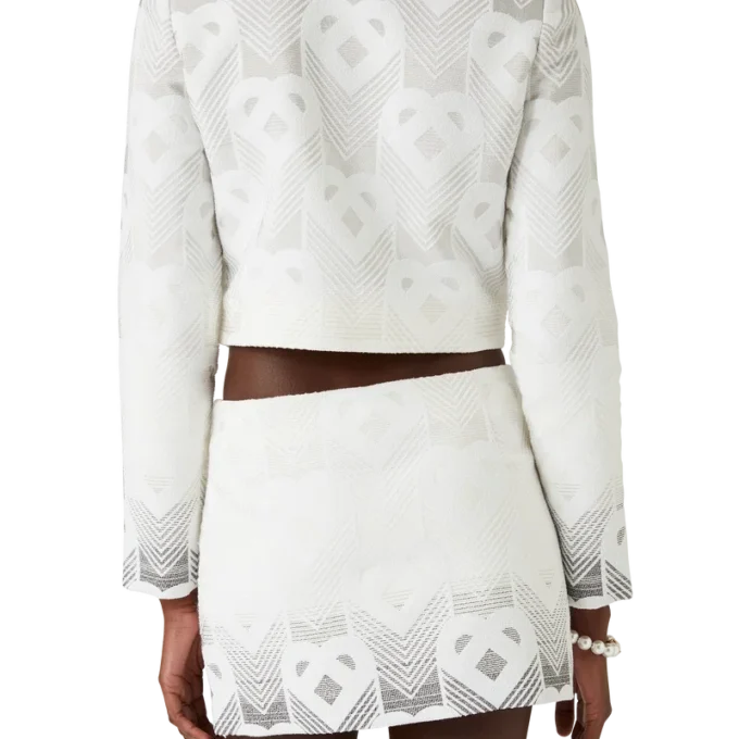 Minirok van badstof met hartjesmonogram in kleurverloop Minirok van badstof met hartjesmonogram in kleurverloop