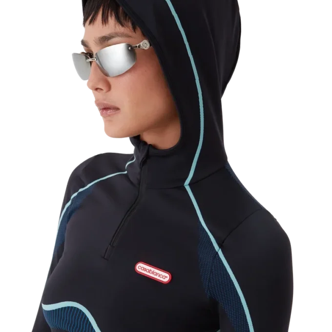 Naadloze top met capuchon en lange mouwen