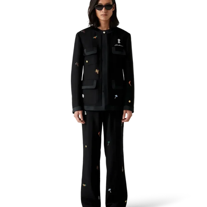 Op maat gemaakte wollen broek met geborduurd motief Op maat gemaakte wollen broek met geborduurd motief