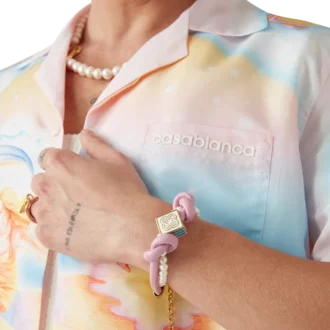 Roze geknoopte parelarmband