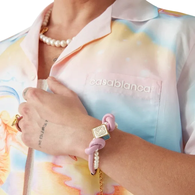 Roze geknoopte parelarmband