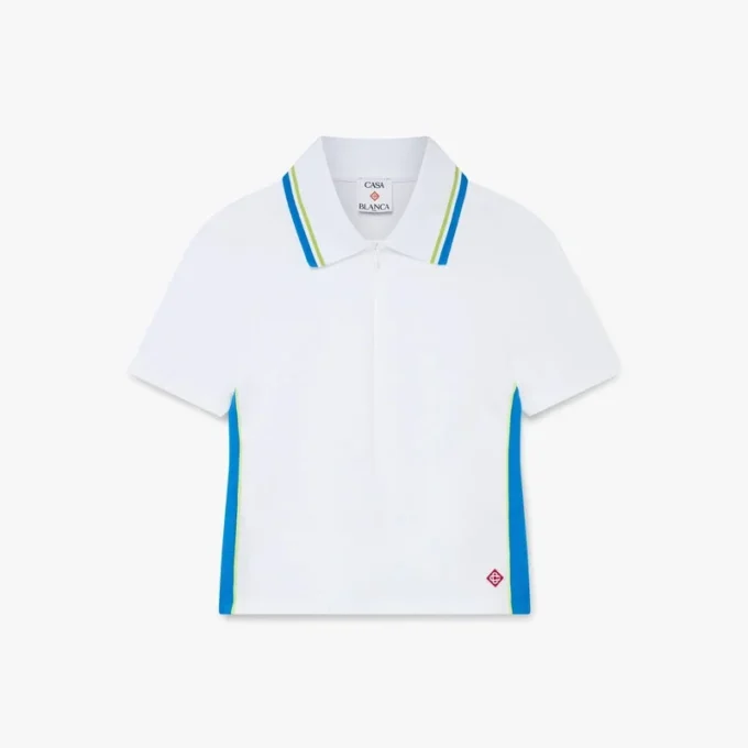 Wit piqué poloshirt met uitsnijdingen